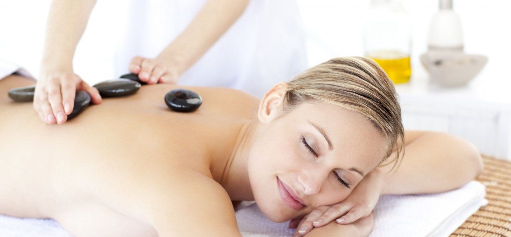 Individual massage stones placed on skin